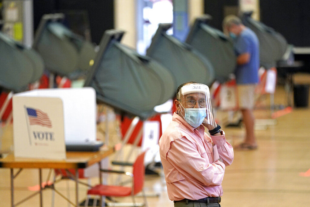 APTOPIX Virus Outbreak Texas Election